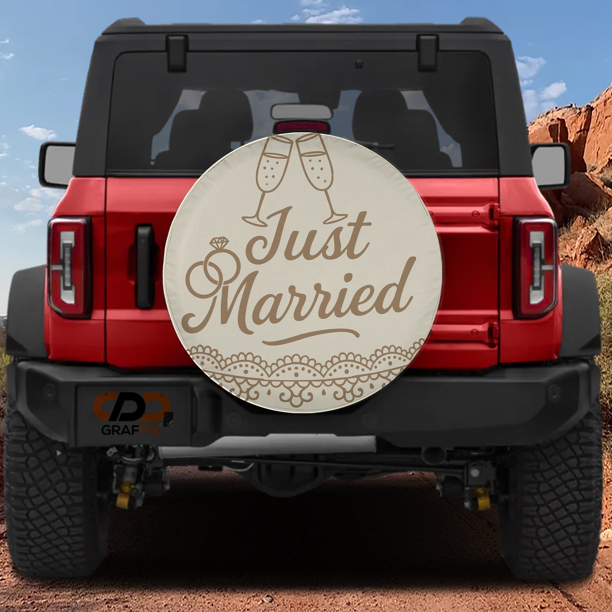 A red Jeep Wrangler with a "Just Married" license plate sticker on the rear window.