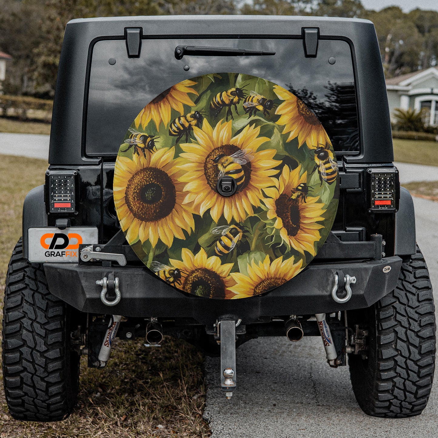 the sunflowers are painted on the back of a jeep