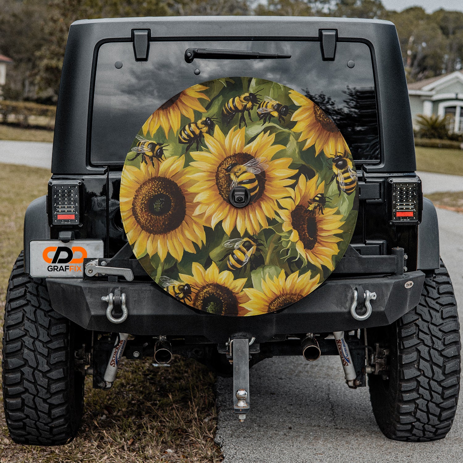 the sunflowers are painted on the back of a jeep