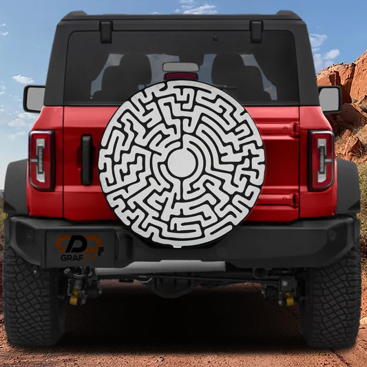 a red Jeep Wrangler with a large maze-like design on the rear window.