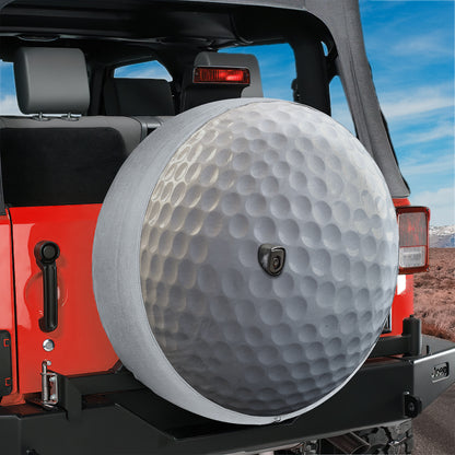A red Jeep Wrangler with a large, textured spare tire mounted on the rear of the vehicle.