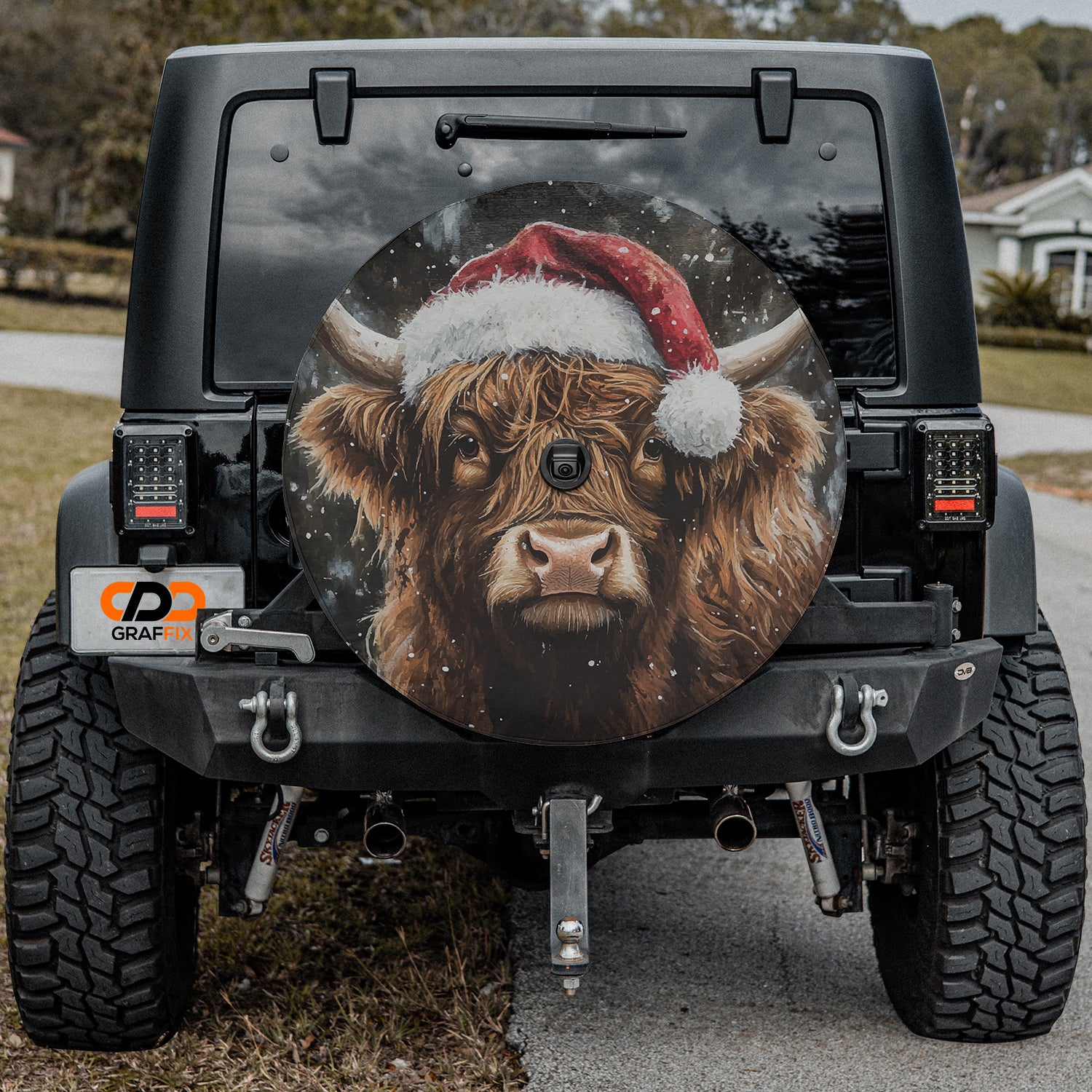 a vehicle with a picture of a bull wearing a santa hat