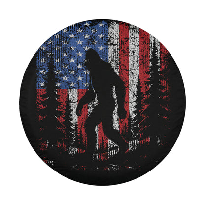 A silhouette of a person walking through a forest, with the American flag in the background.