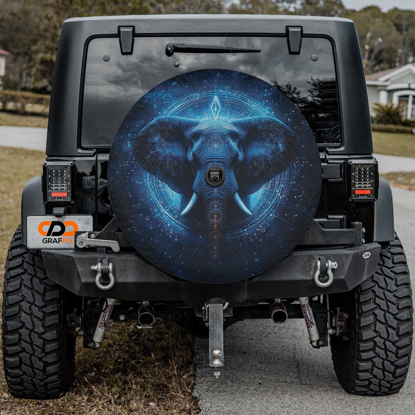 a jeep with a picture of an elephant on the front