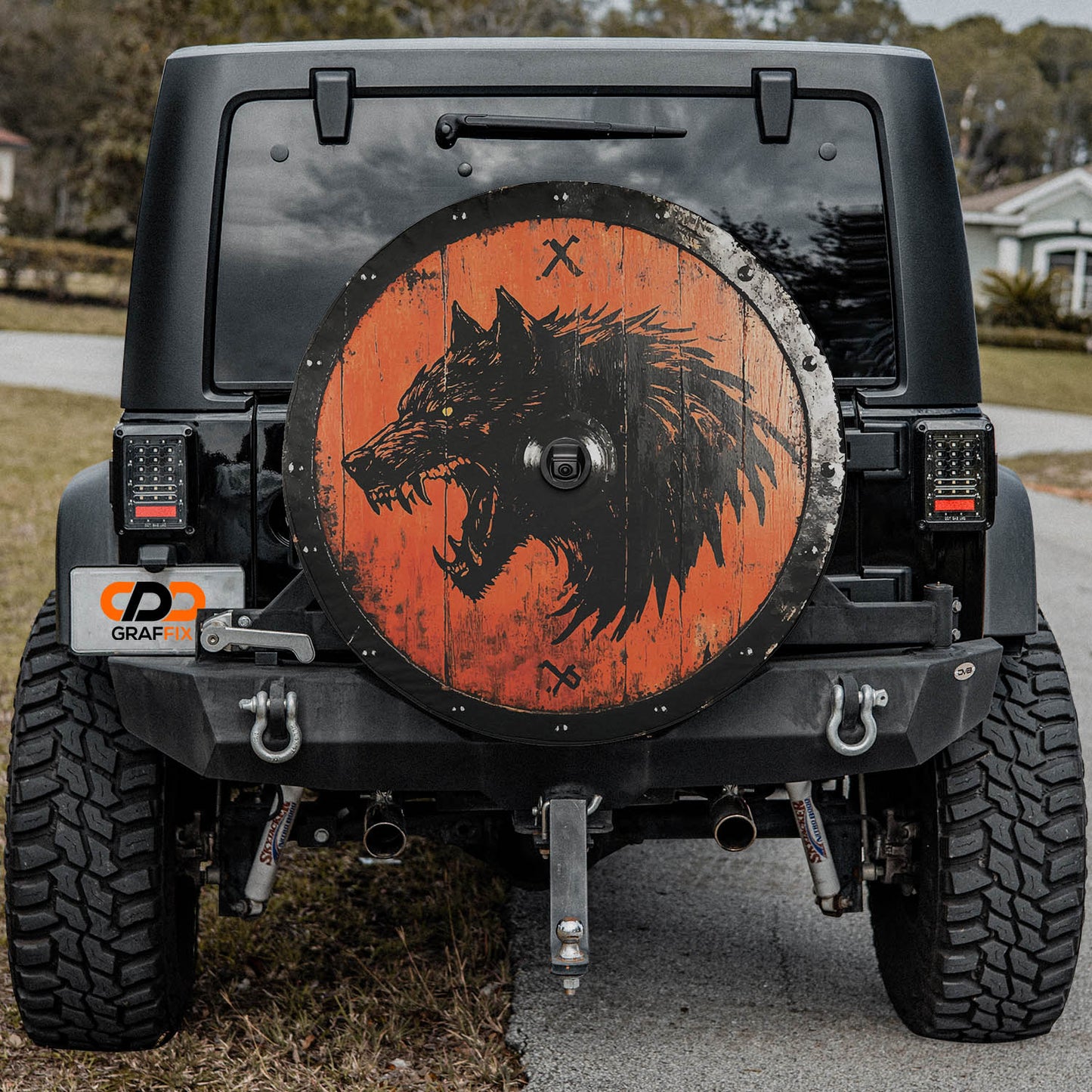 a jeep with a picture of a wolf on it