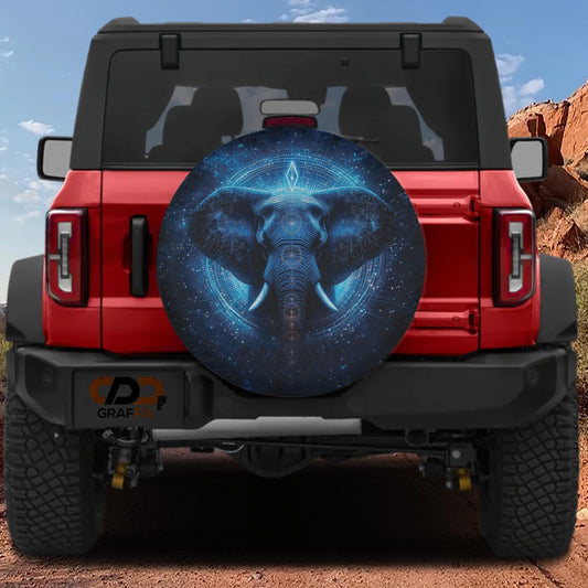 a red Jeep Wrangler with a large elephant-themed spare tire cover on the rear.