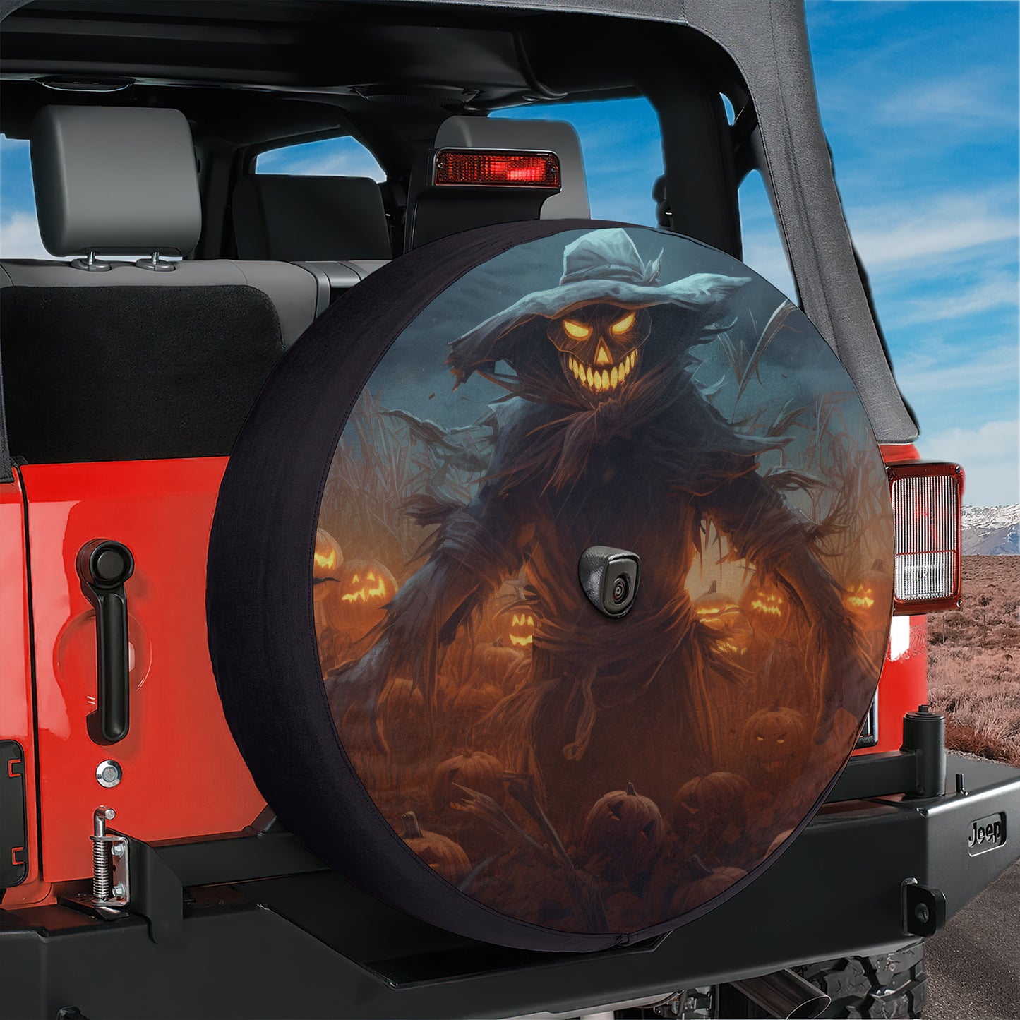 A large, spooky-looking wheel cover with a creepy, glowing figure on it, which appears to be a Halloween-themed design.
