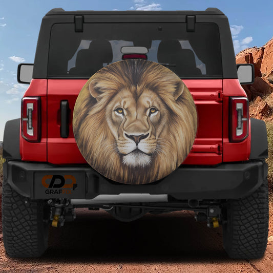 A red Jeep Wrangler with a large lion head decal on the rear window.