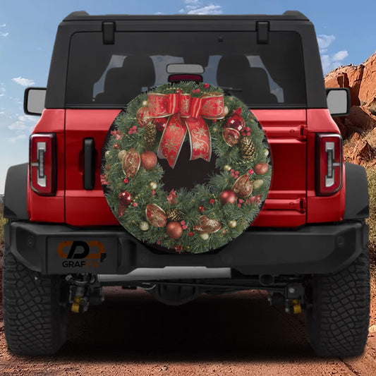 the back of a red Jeep Wrangler with a large Christmas wreath attached to the rear bumper.