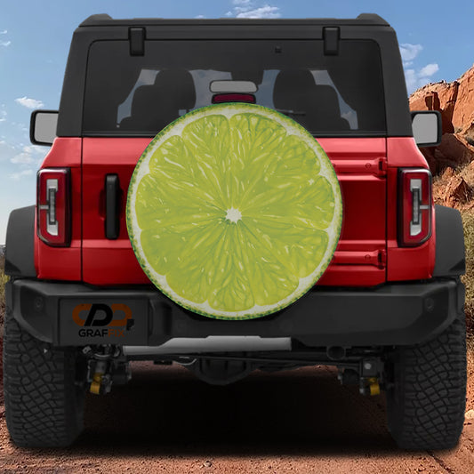A red Jeep Wrangler with a large lime slice decal on the rear window.