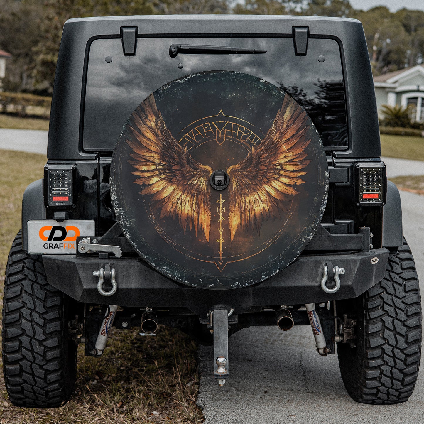 a black jeep with a picture of an eagle on it