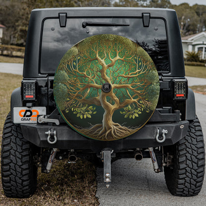 a tire cover with a tree painted on it