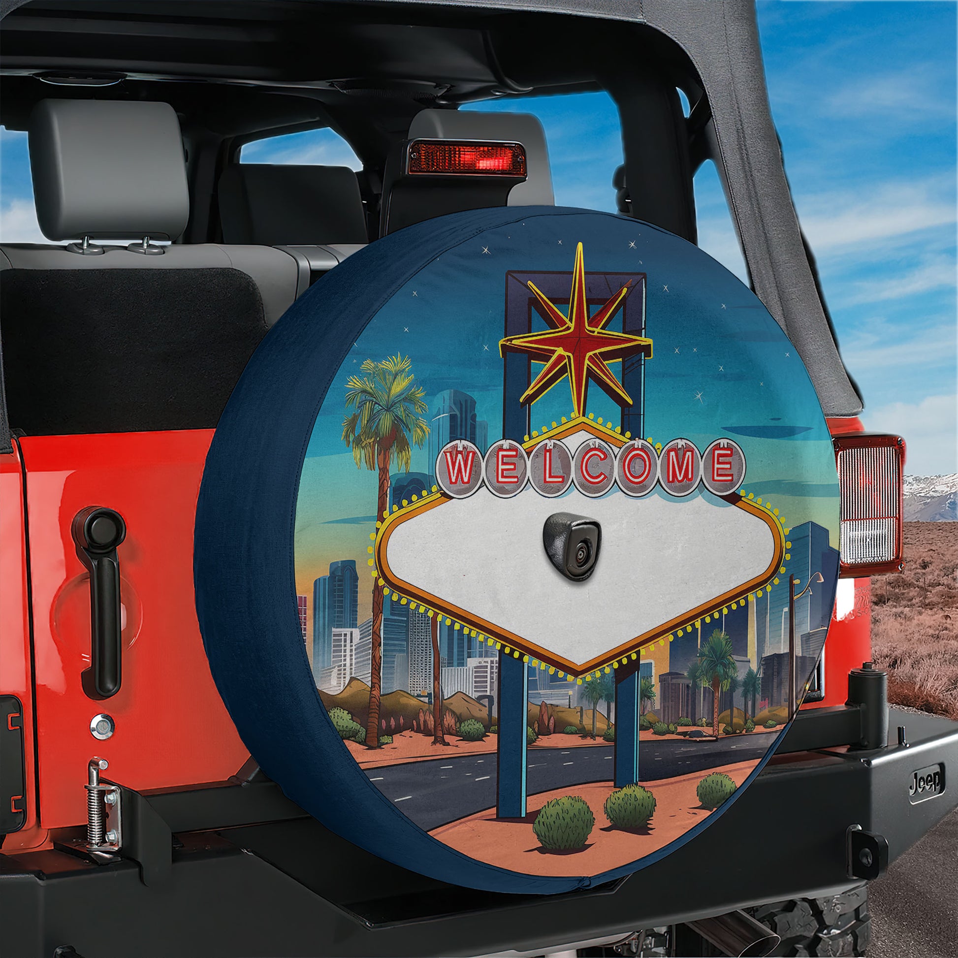 a Jeep vehicle with a large tire cover that displays a Las Vegas-themed design, including a star and a sign.