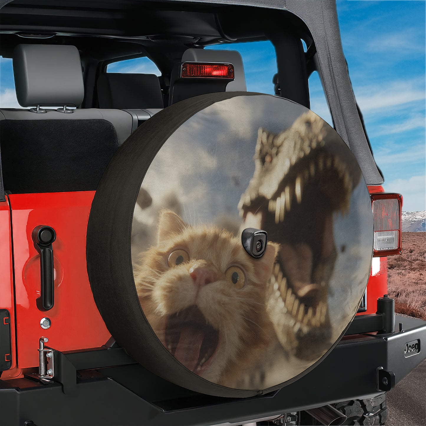 A red Jeep with a large tire cover featuring a cat and a dinosaur, creating a humorous and playful scene.