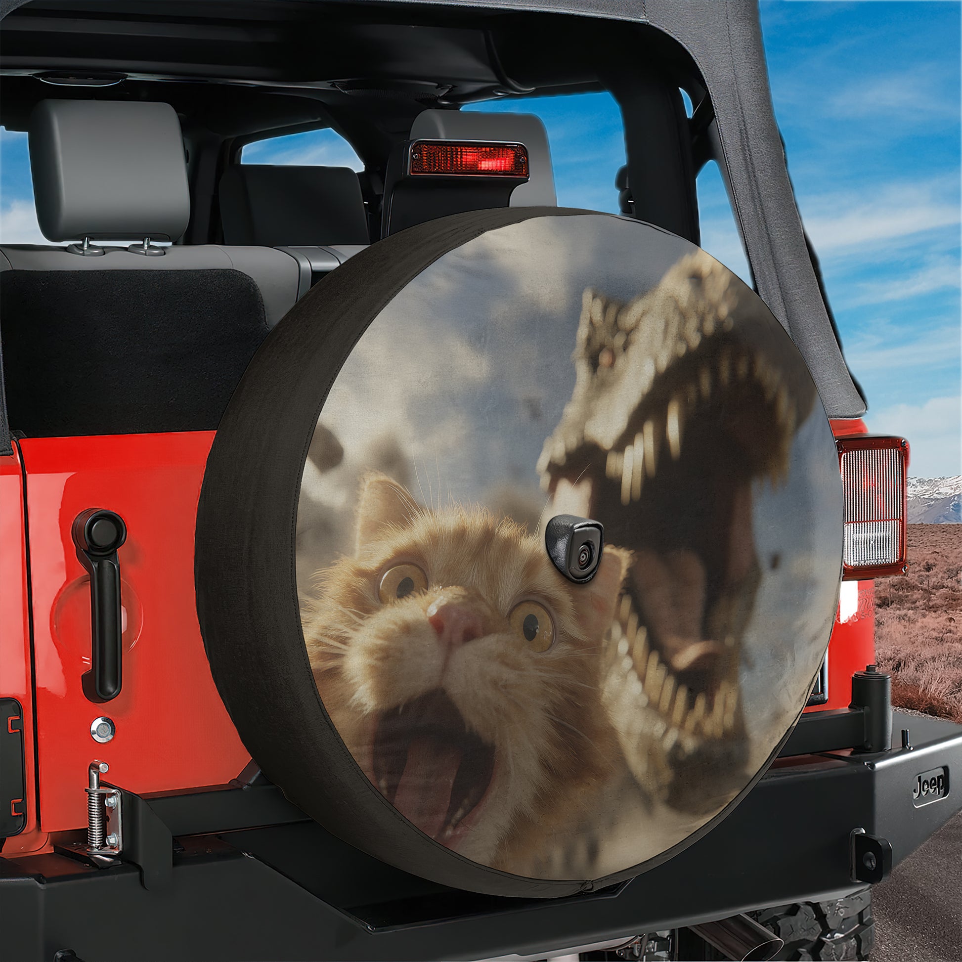 A red Jeep with a large tire cover featuring a cat and a dinosaur, creating a humorous and playful scene.