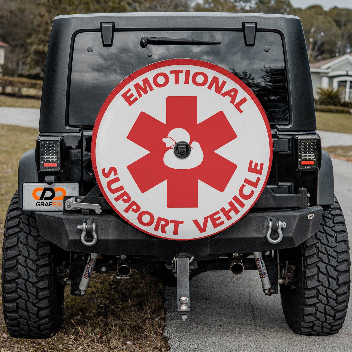 a red and white sign on the back of a black jeep