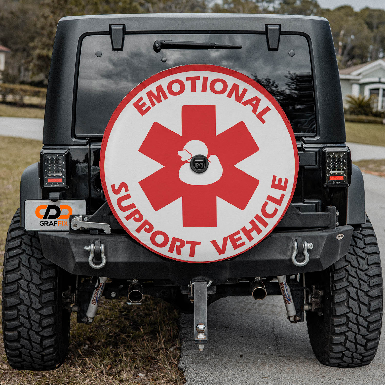 a red and white sign on the back of a black jeep