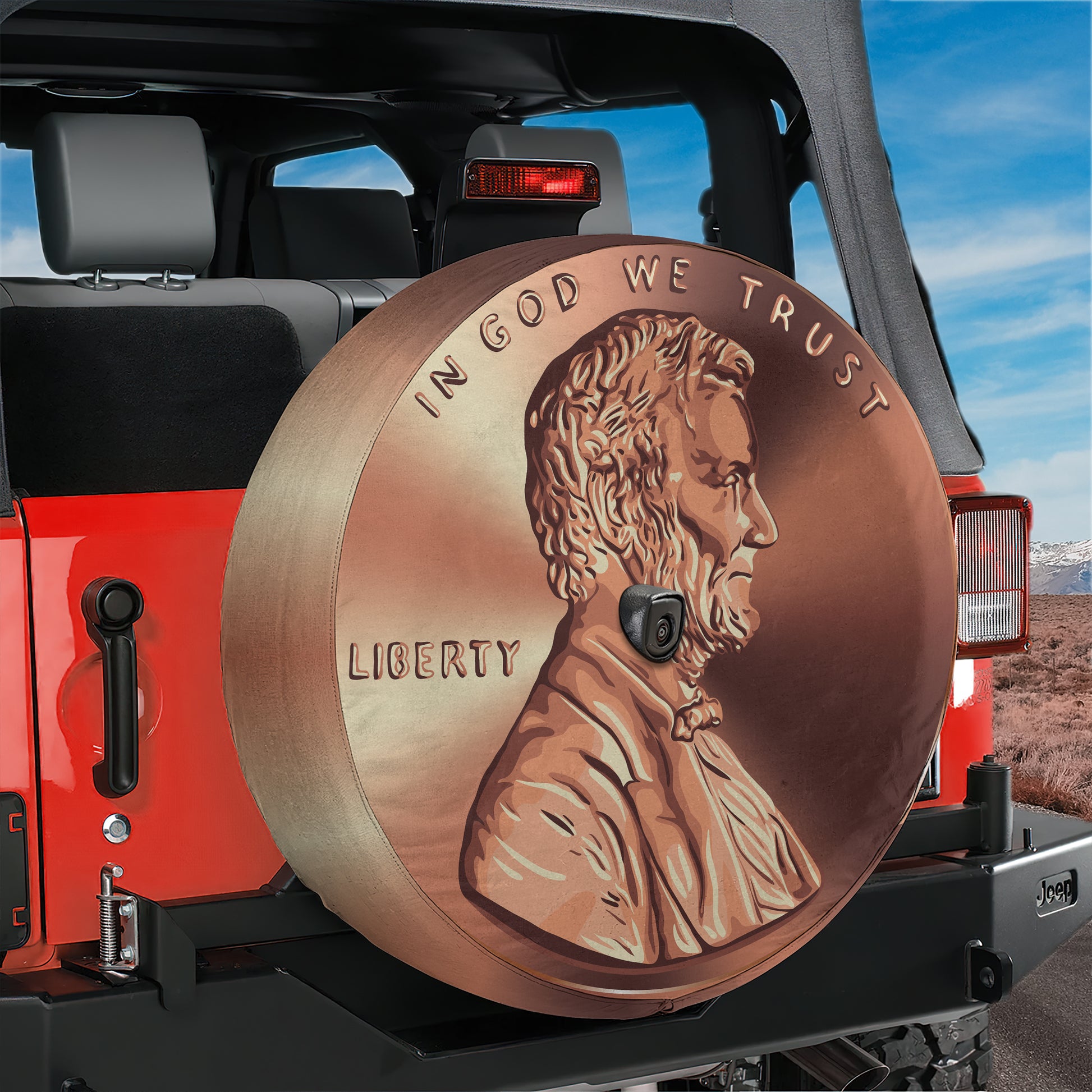 A large, detailed image of a man's head on a spare tire cover, with the words "LIBERTY" and "IN GOD WE TRUST" printed on it.