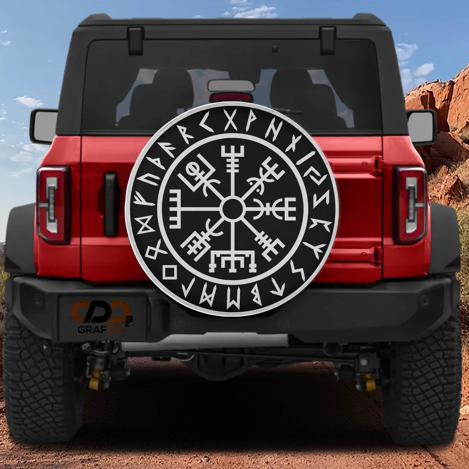 a red Jeep Wrangler with a large Viking symbol on the rear window.