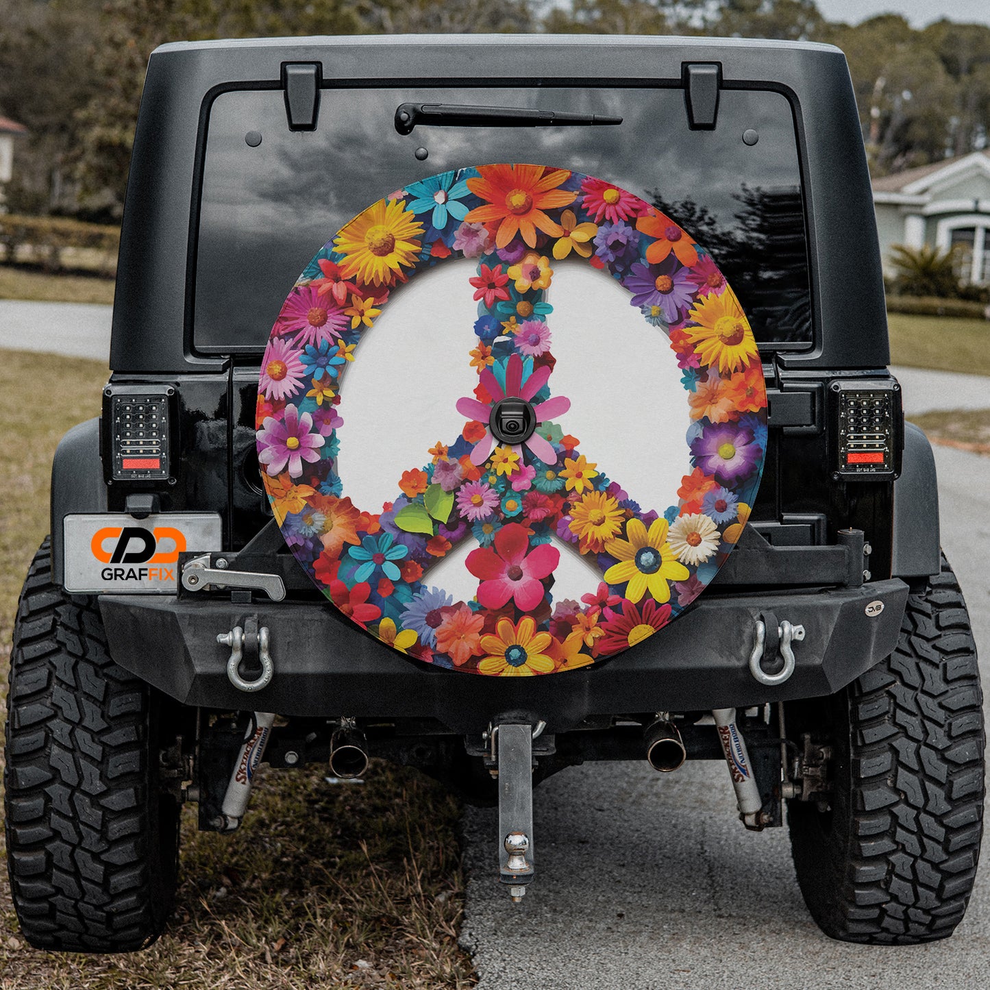 a peace sign painted on the back of a jeep