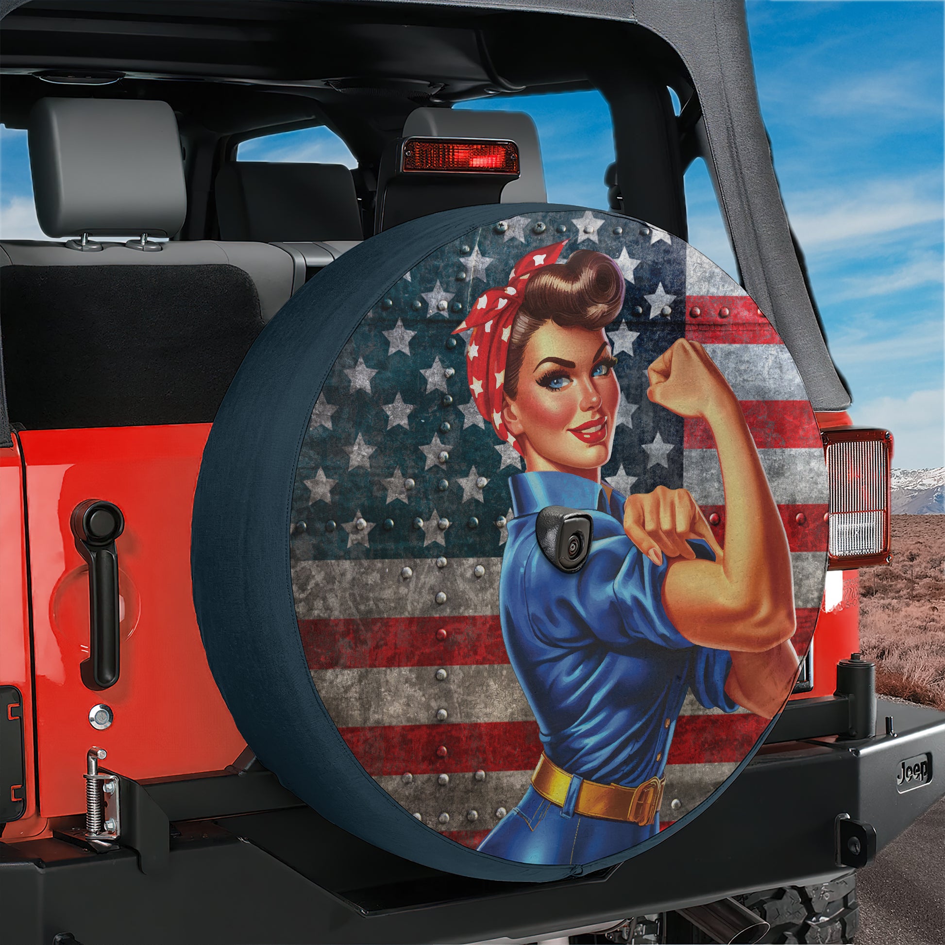 A red Jeep with a large American flag-themed spare tire cover on the rear window.