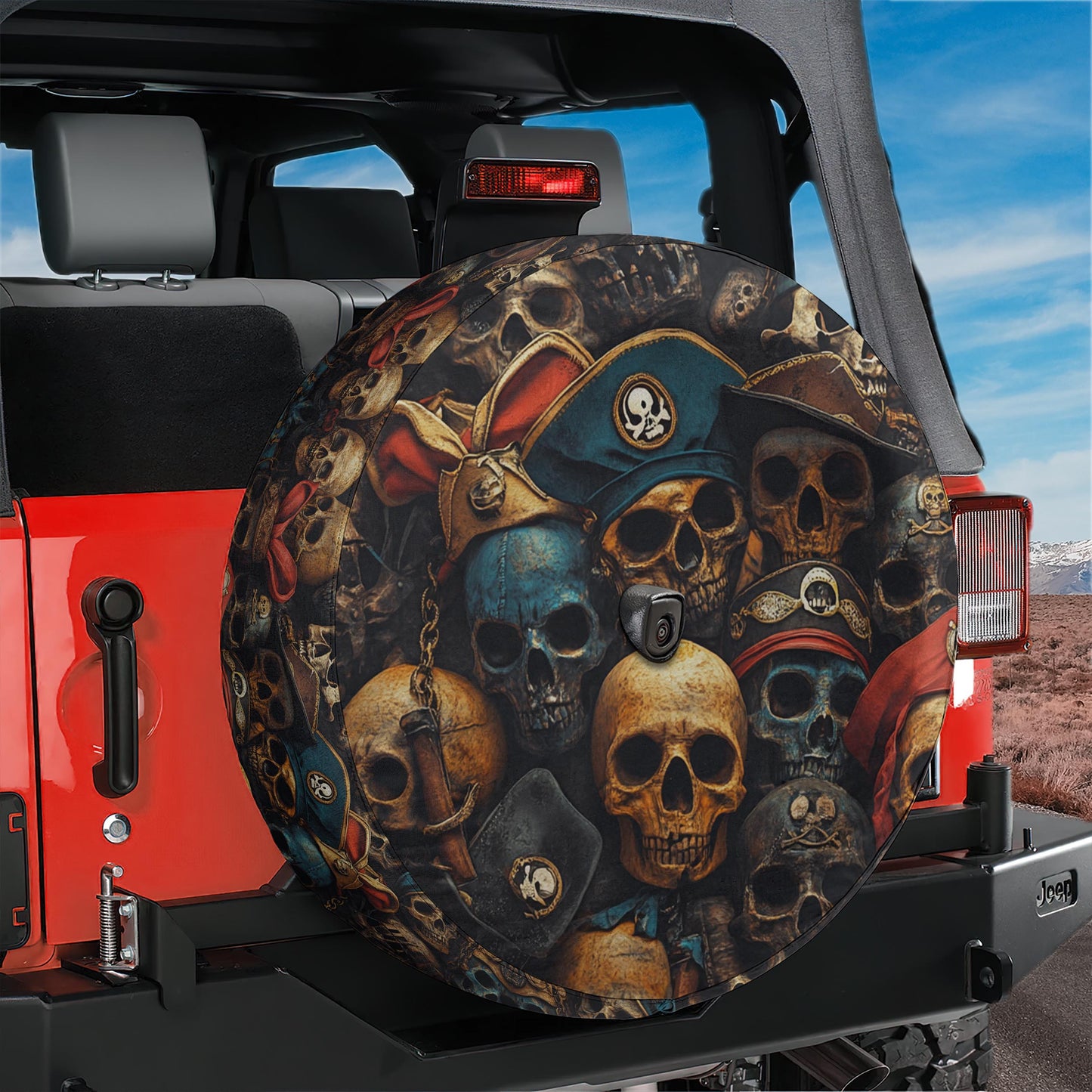 A red Jeep with a skull and crossbones-themed spare tire cover attached to the rear of the vehicle.