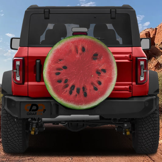 a red Jeep Wrangler with a large watermelon sticker on the rear window.