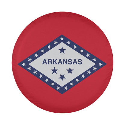 A red wheel cover with the text "ARKANSAS" and a flag design featuring stars and stripes.