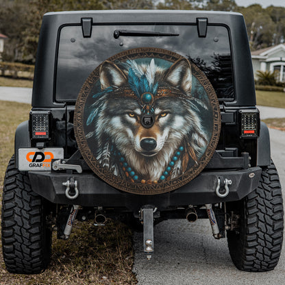 a black Jeep Wrangler with a large tribal-style decal on the rear window.