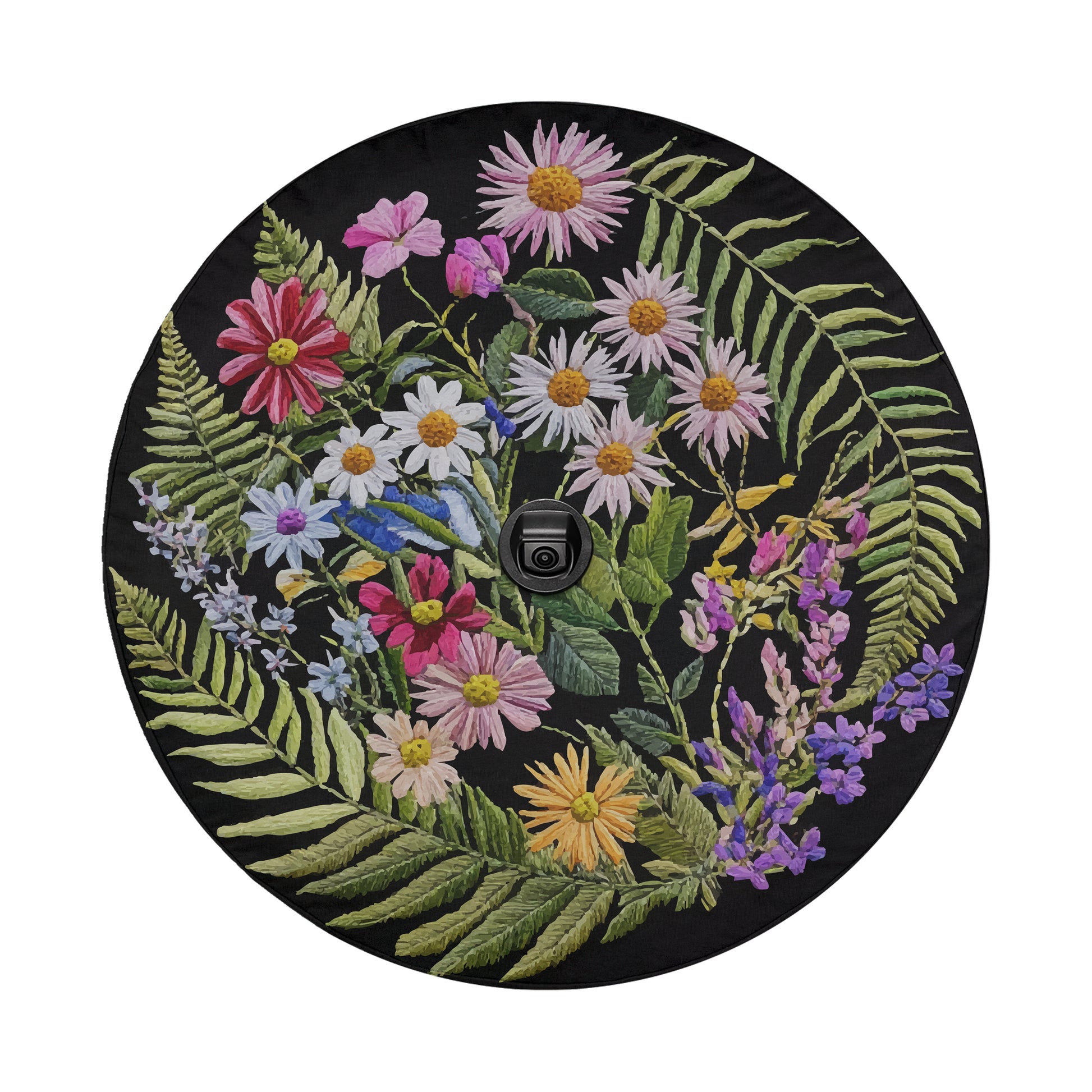 The image is a circular arrangement of various colorful flowers and leaves, including daisies, chrysanthemums, and ferns, all set against a black background.