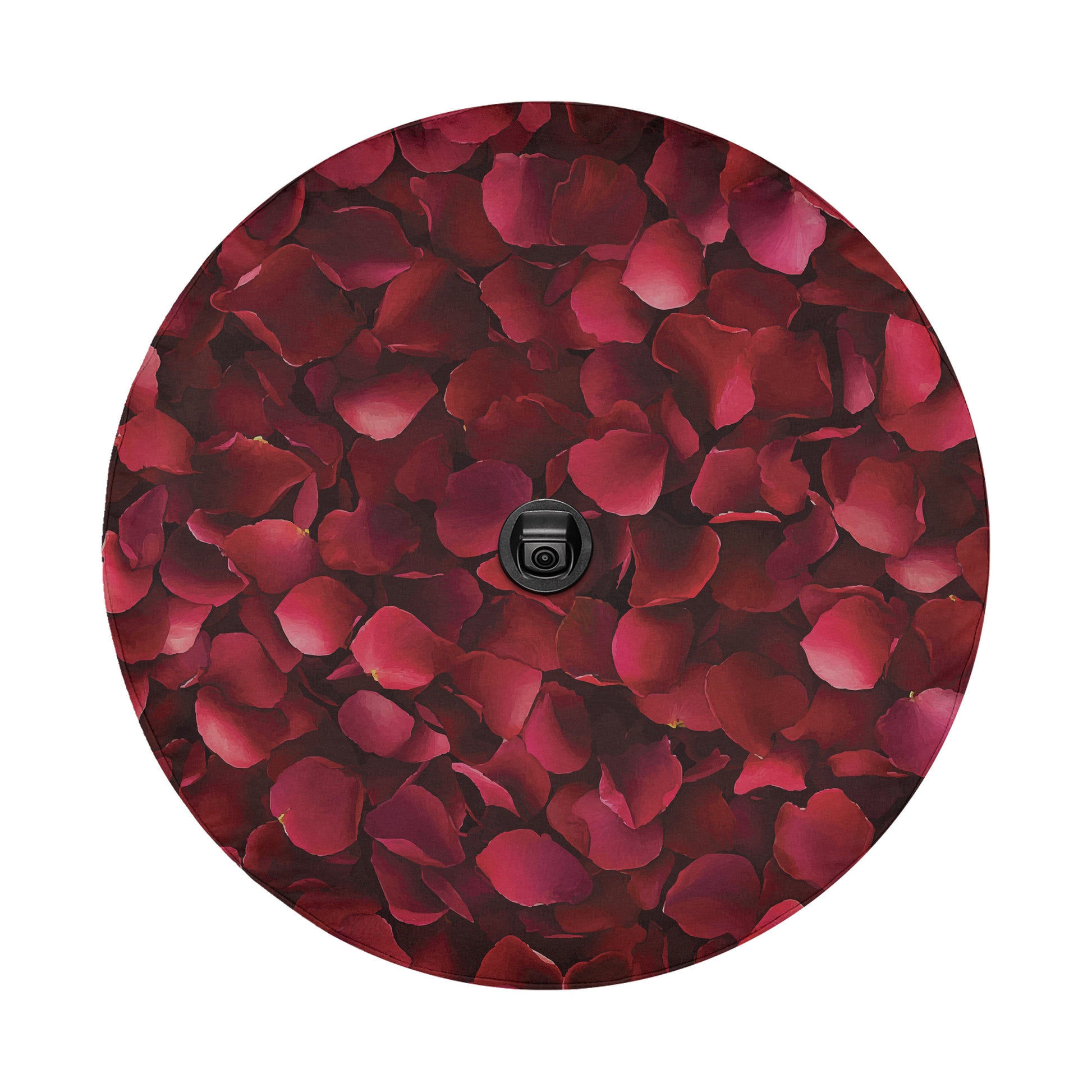 a close-up view of a collection of red rose petals arranged in a circular pattern.