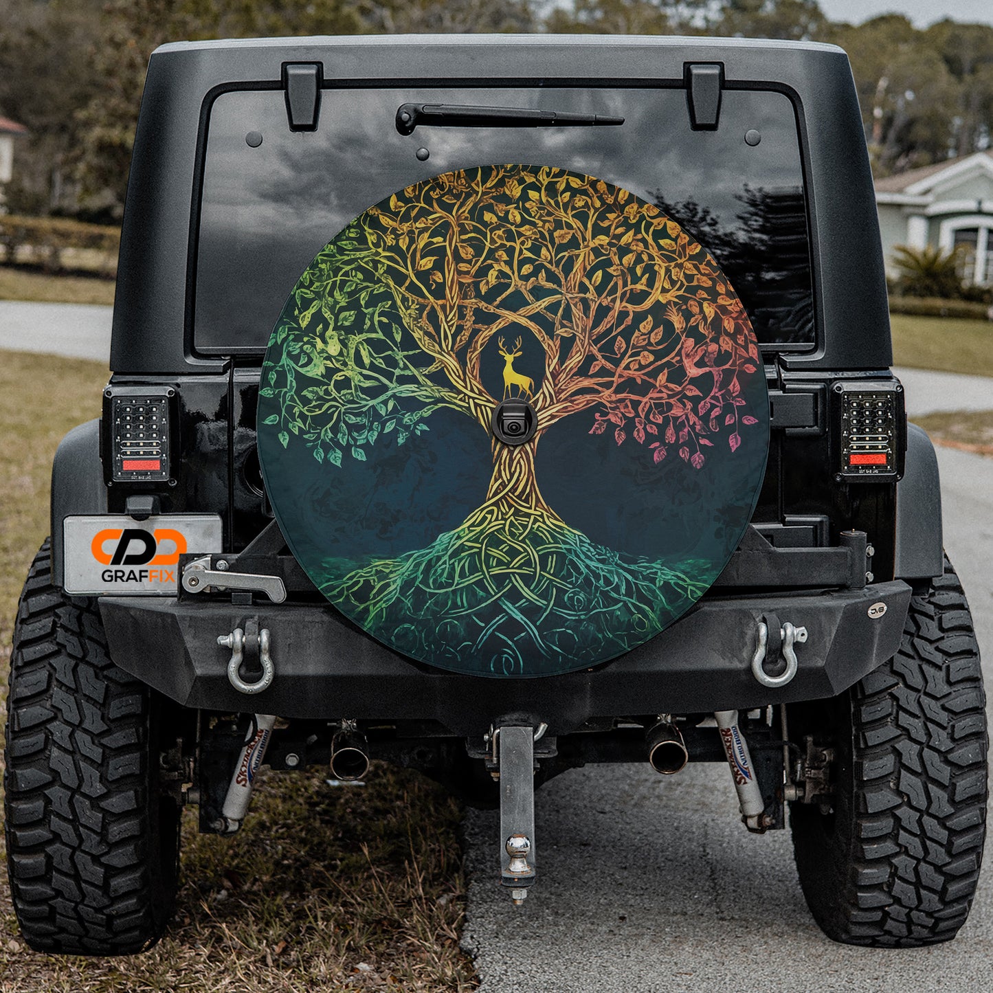 a jeep with a tree painted on the side of it