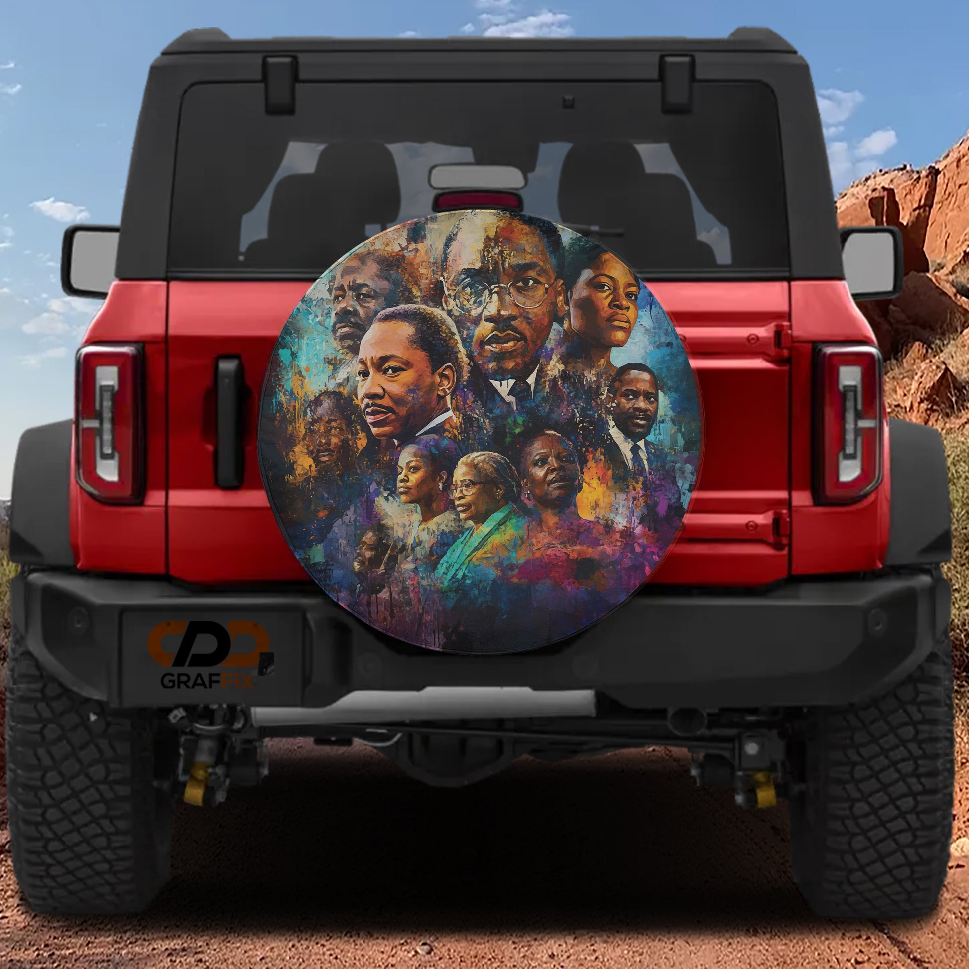 a red Jeep Wrangler with a large, colorful wheel cover depicting a group of people.