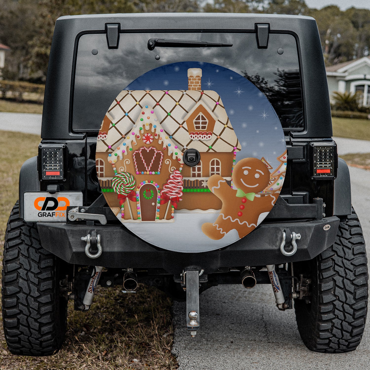 a decorated jeep with a gingerbread house and ginger cookies