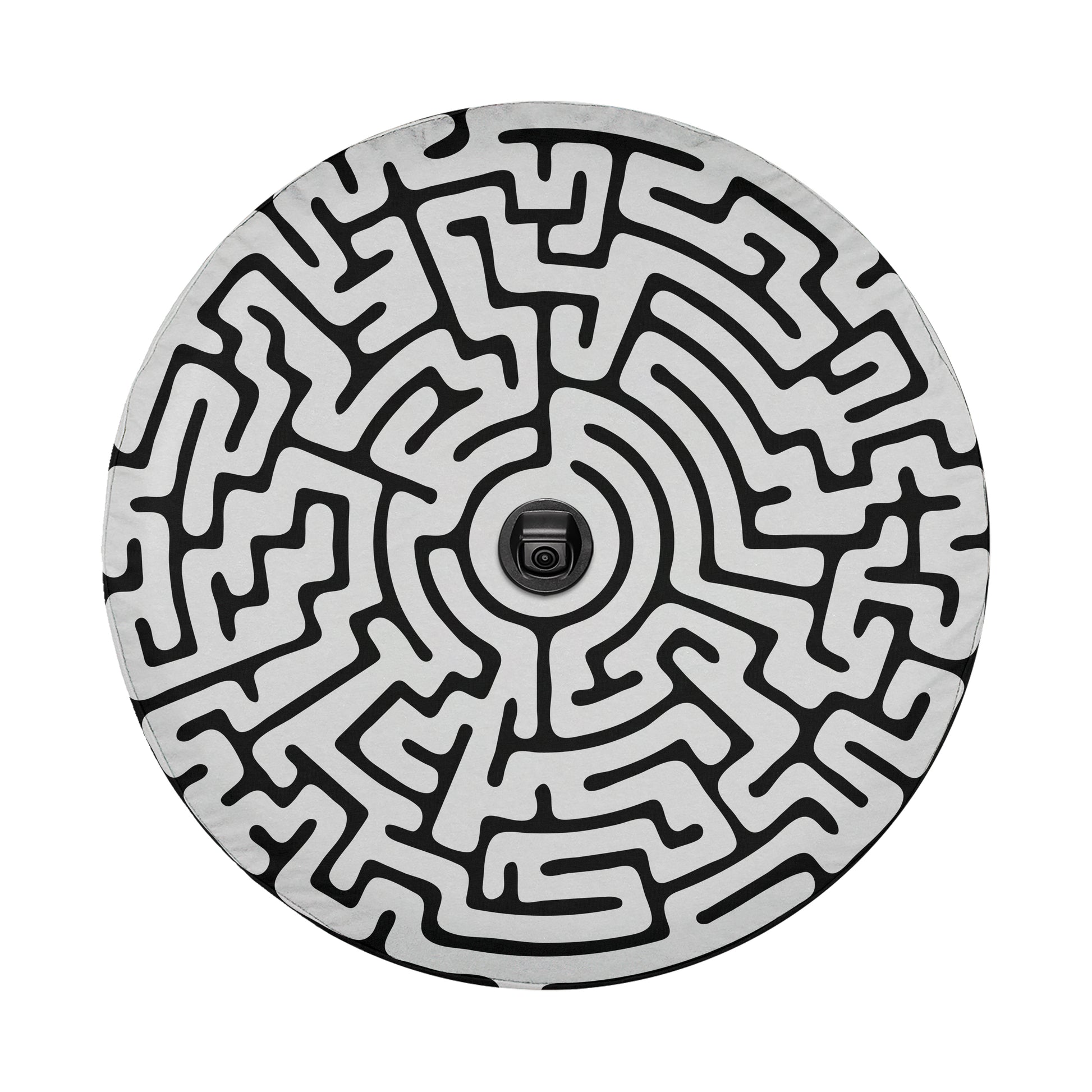 a complex, intricate maze-like pattern with a central black camera lens, creating a visually striking and abstract composition.