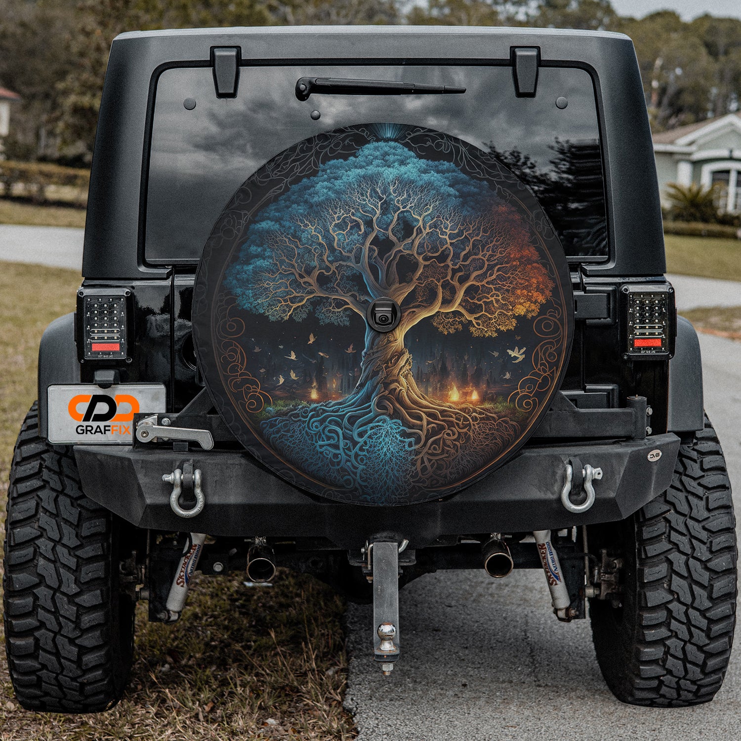 a jeep with a tree painted on the front