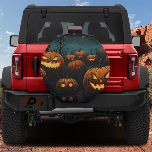 a red Jeep Wrangler with a Halloween-themed spare tire cover on the rear.