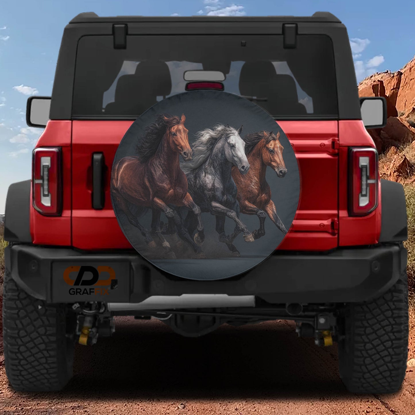 A red Jeep Wrangler with a large round spare tire featuring a graphic of three horses running.