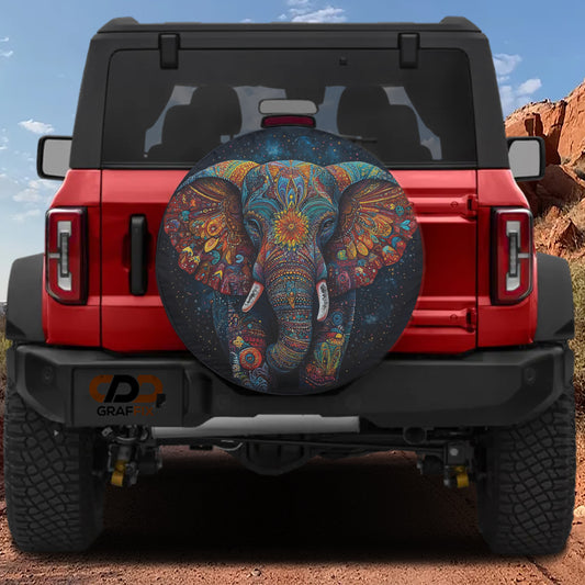 a red Jeep Wrangler with a large elephant-themed spare tire attached to it.