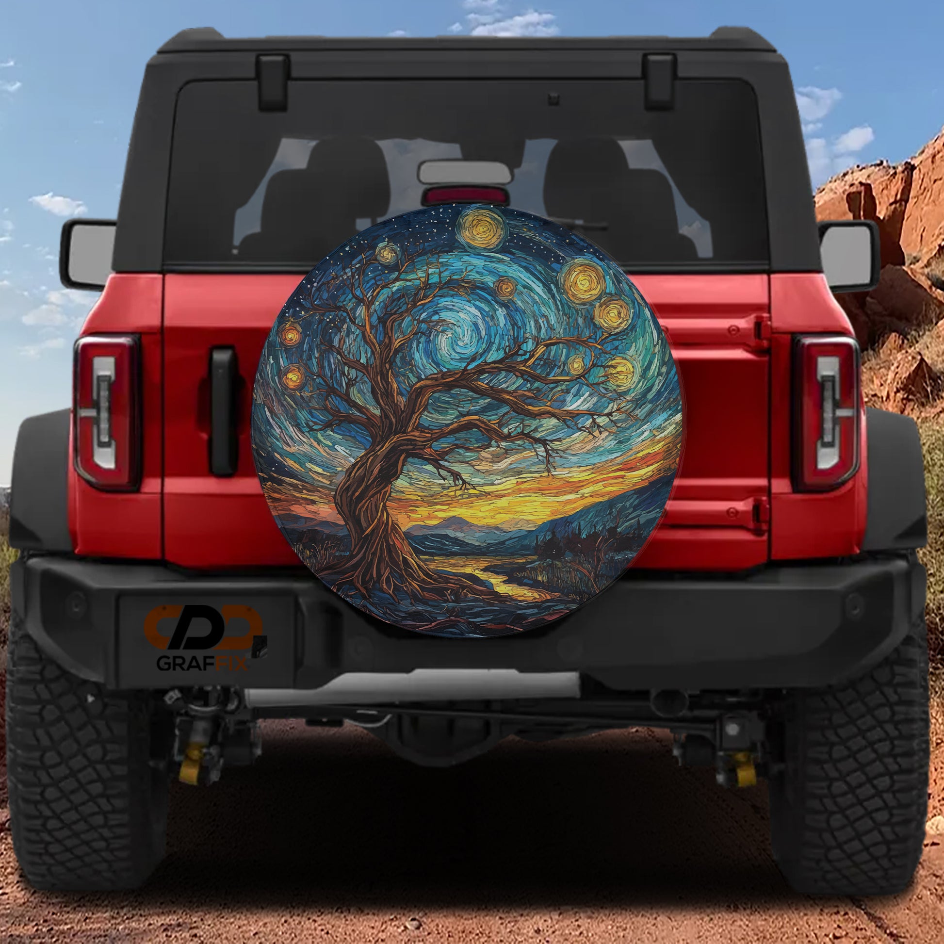 the back of a red Jeep Wrangler with a large, colorful tree design on the spare tire cover.
