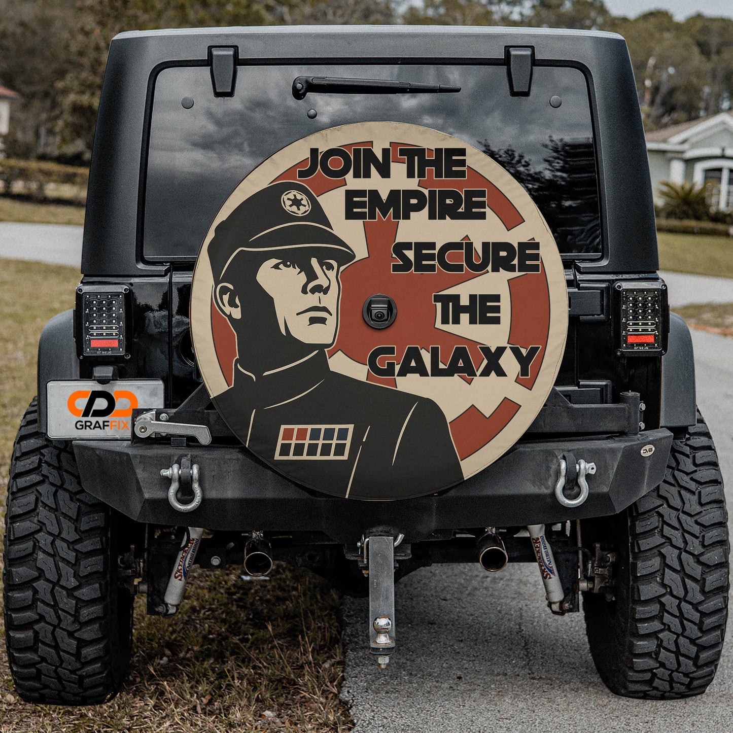 a black jeep with a large, circular decal on the rear window that says "JOIN THE EMPIRE SECURE THE GALAXY".