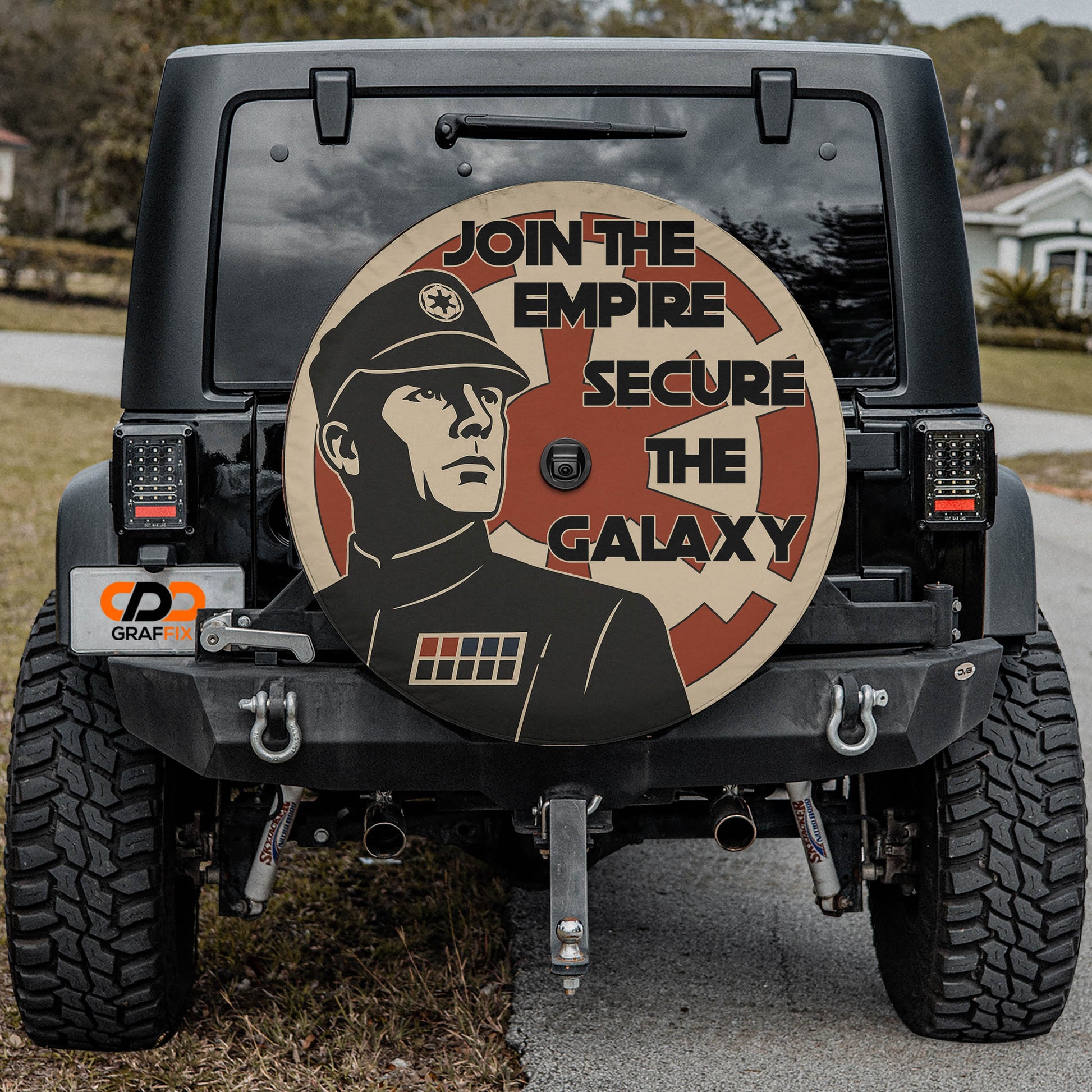a black jeep with a large, circular decal on the rear window that says "JOIN THE EMPIRE SECURE THE GALAXY".