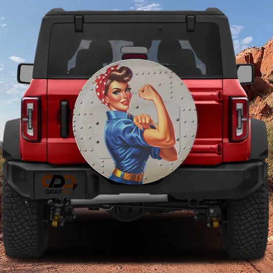 a red Jeep Wrangler with a large, round decal of a woman with a determined expression on the rear window.