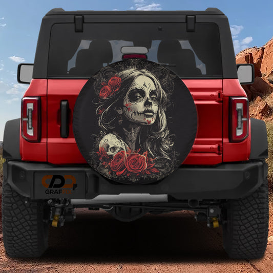 a red Jeep Wrangler with a large, decorative tire cover on the rear of the vehicle. The cover depicts a skull with roses, creating a striking and eye-catching design.