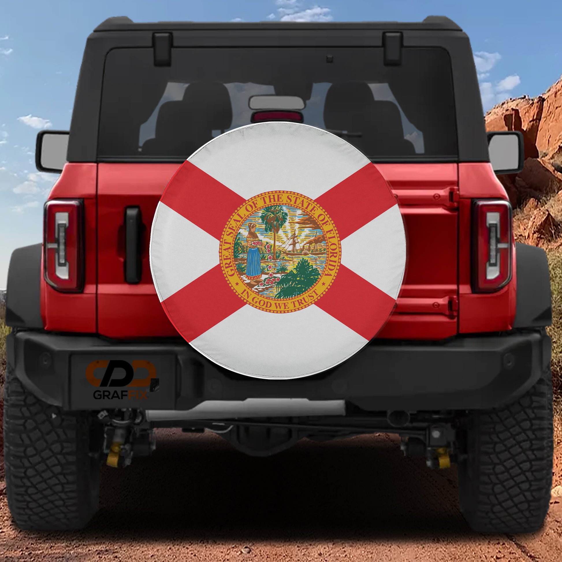 the back of a red Jeep Wrangler with a Florida state flag decal on the rear window.