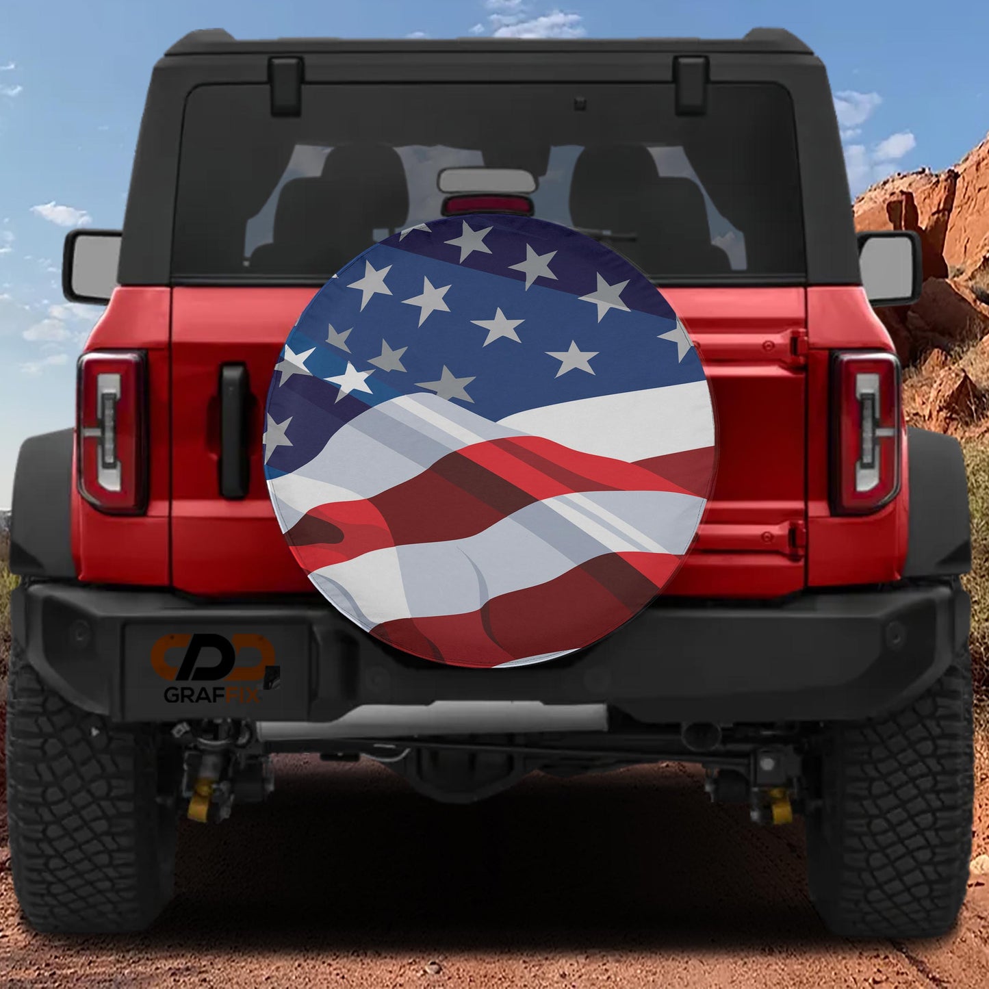 the back of a red Jeep Wrangler with an American flag-themed spare tire attached to it.