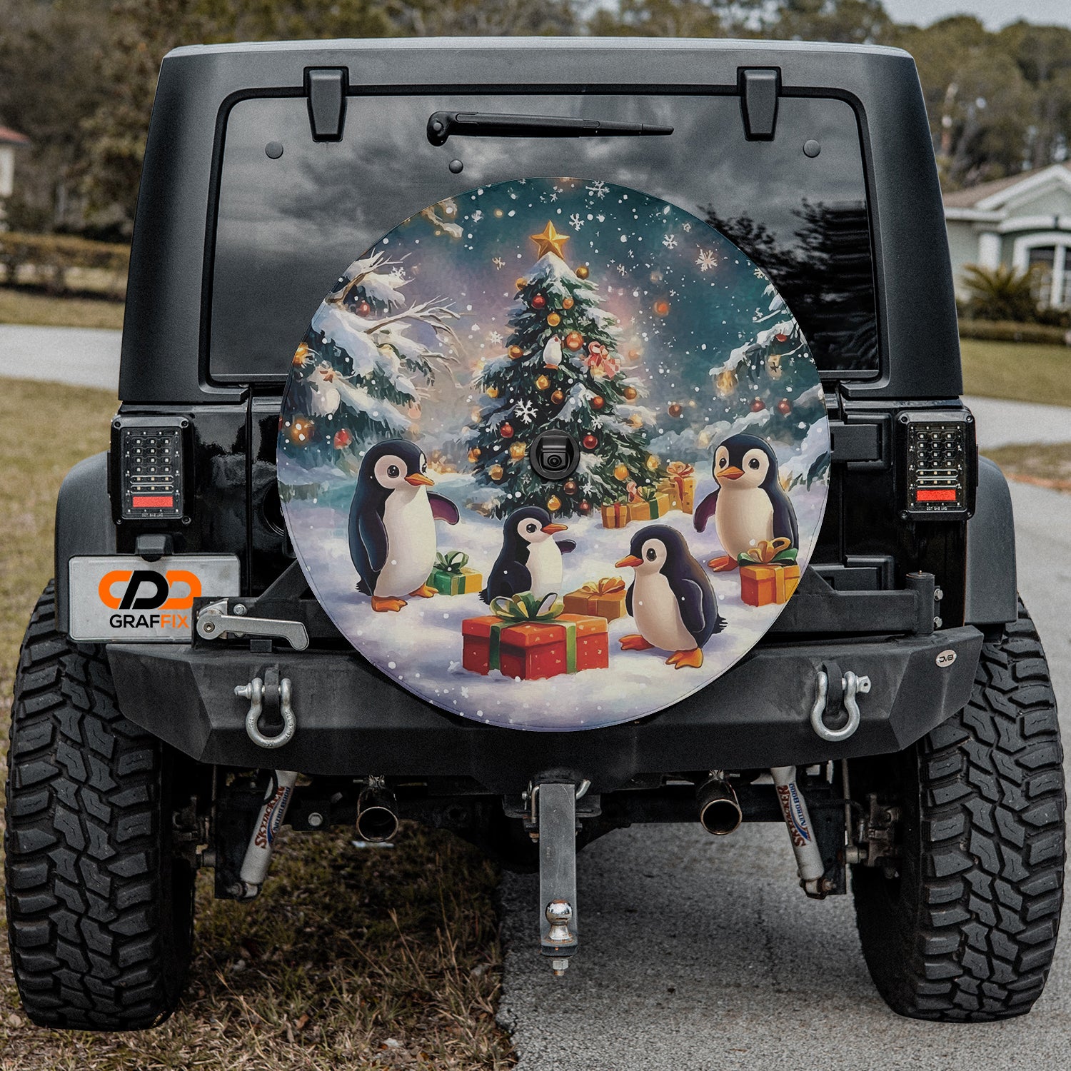 a decorated jeep with penguins and a christmas tree