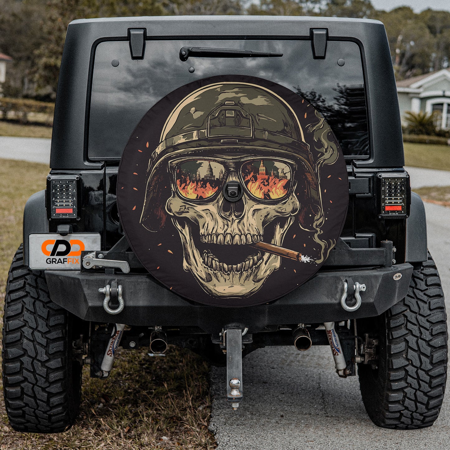 a jeep with a skull painted on the side of it