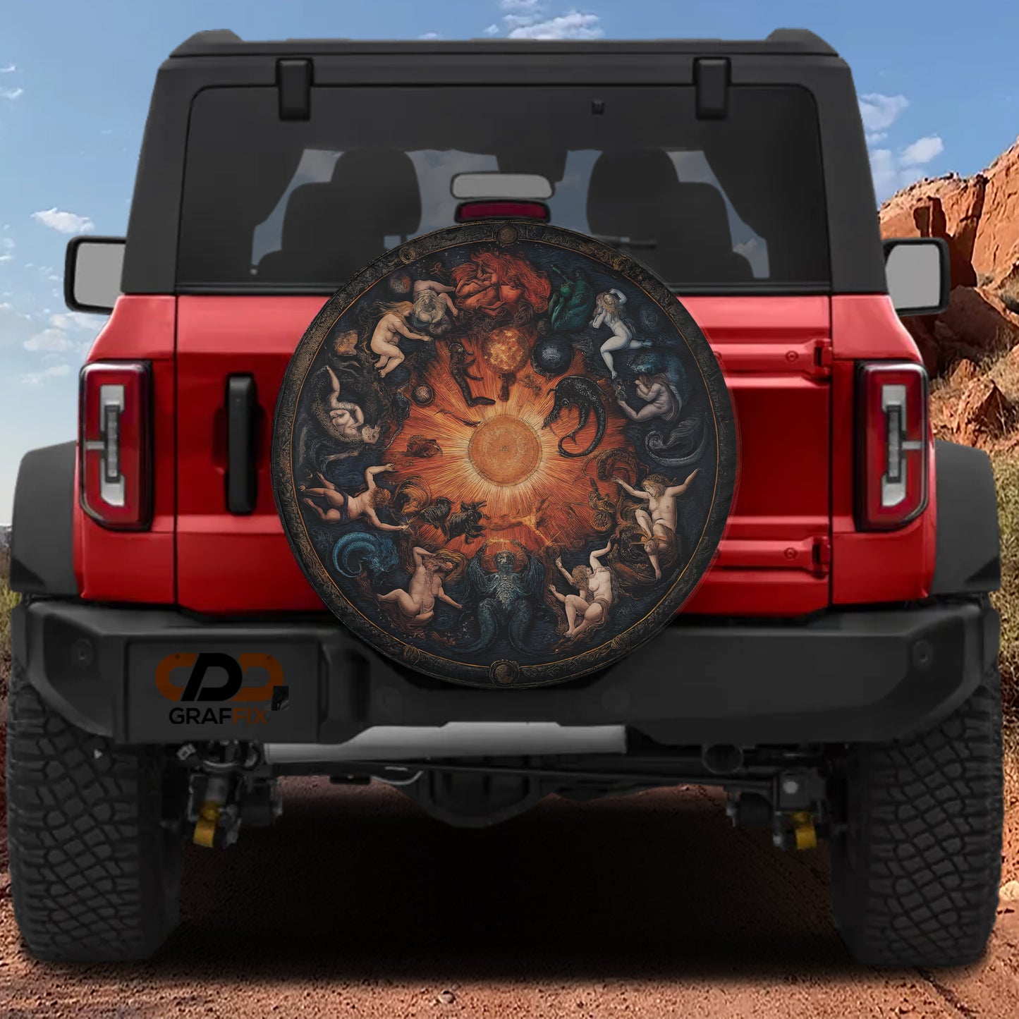 the rear of a red Jeep Wrangler with a large, decorative wheel cover featuring a sun design.