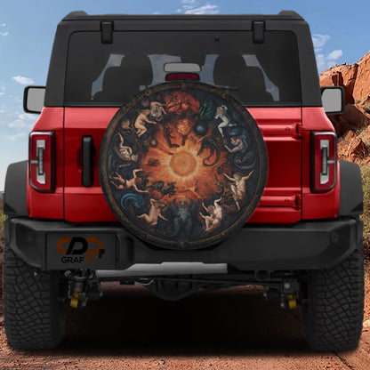 the rear of a red Jeep Wrangler with a large, decorative wheel cover featuring a sun design.